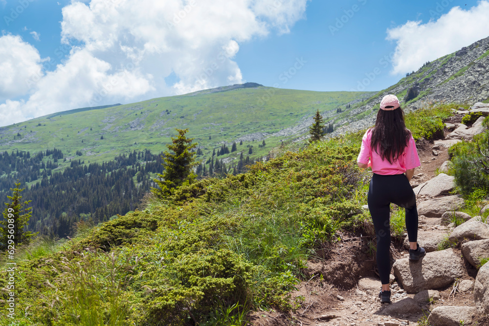 Fit Woman in the beautiful green summer mountain . Vitosha mountain ,Bulgaria Fit Woman in the beautiful green summer mountain . Vitosha mountain ,Bulgaria