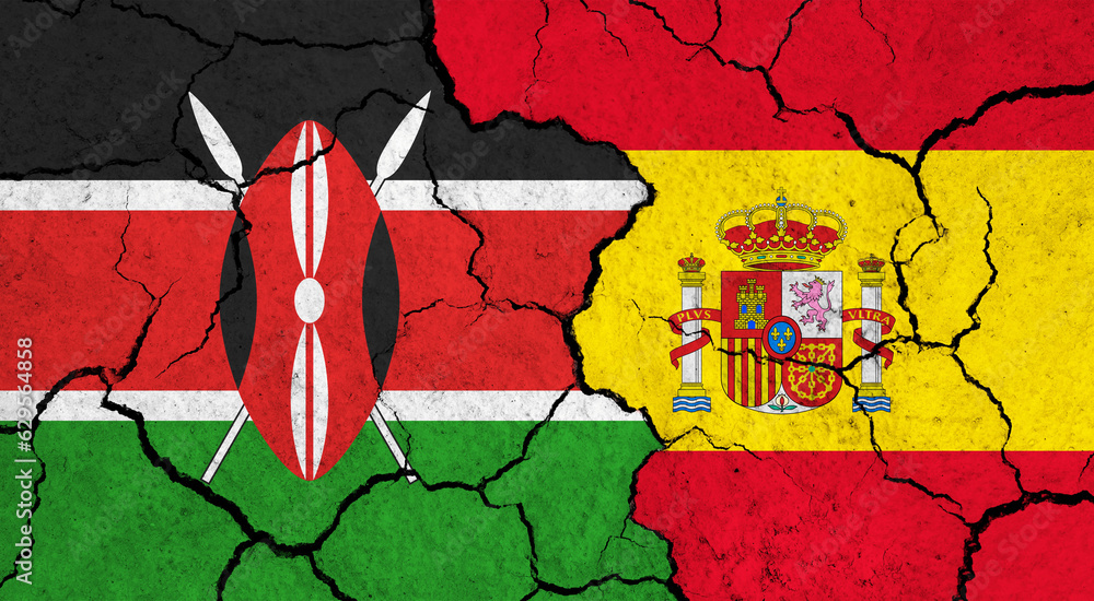 Flags of Kenya and Spain on cracked surface - politics, relationship concept