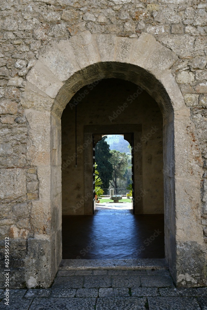 Historic entryway to the medieval monastery near the ancient abbey of Casamari, Italy