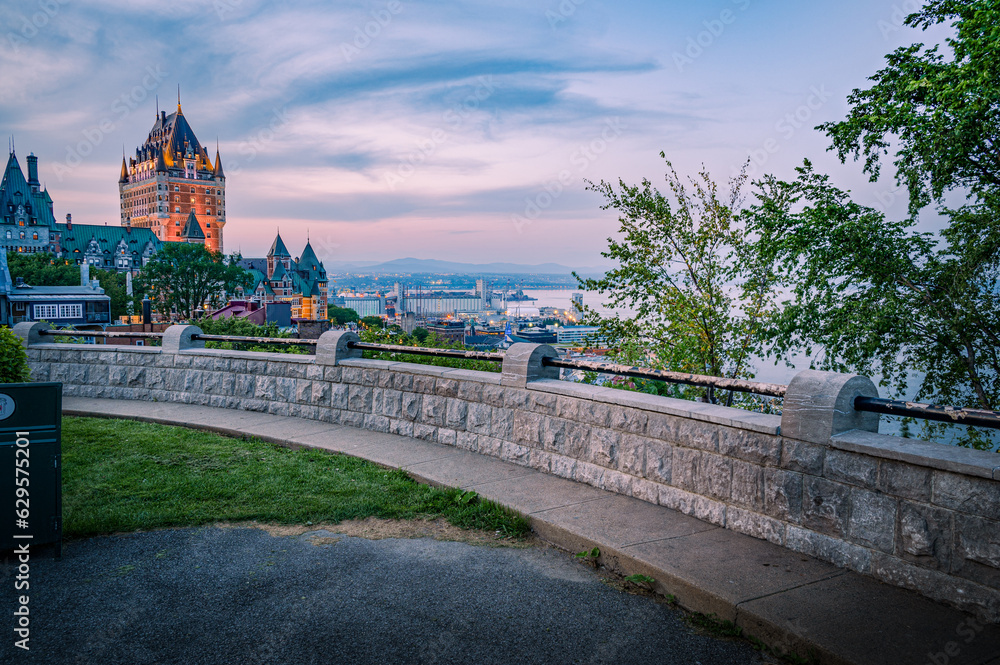 Nice and warm summer evening aound Chateau Frontenac under dusk light, Old Quebec city, Canada