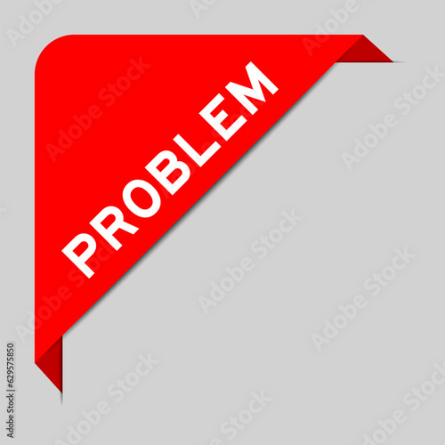 Red color of corner label banner with word problem on gray background