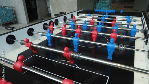 Football table or soccer table game with plastic player figurine. Mini Soccer game which famous in past and be collectable item for foosball lover. Play by two hand control each row of player figurine