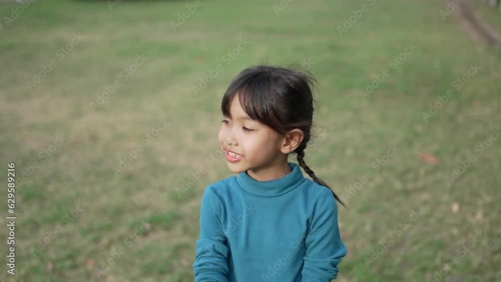 A girl running in the grass and happy with nature. A girl running in the grass and happy with nature.