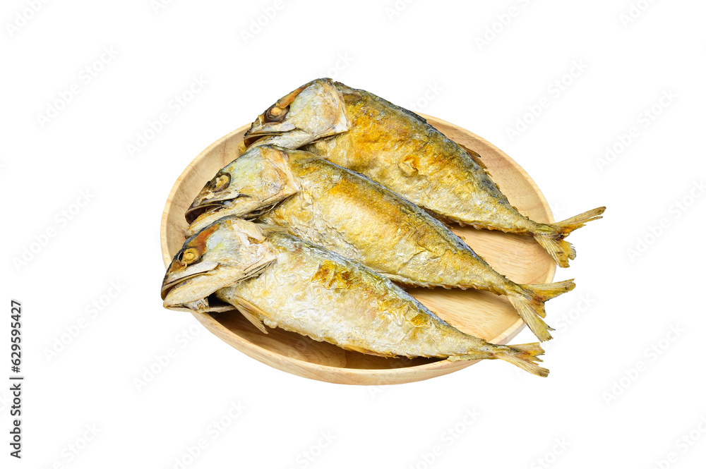 three fried mackerel in circle wood plate on a white background ,isolated three fried mackerel in circle wood plate on a white background ,isolated