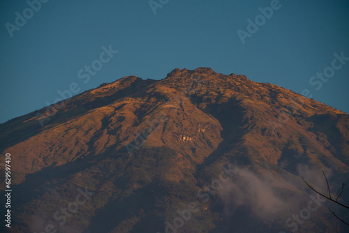 Peak of Sumbing Mountain with blue sky  Indonesia.