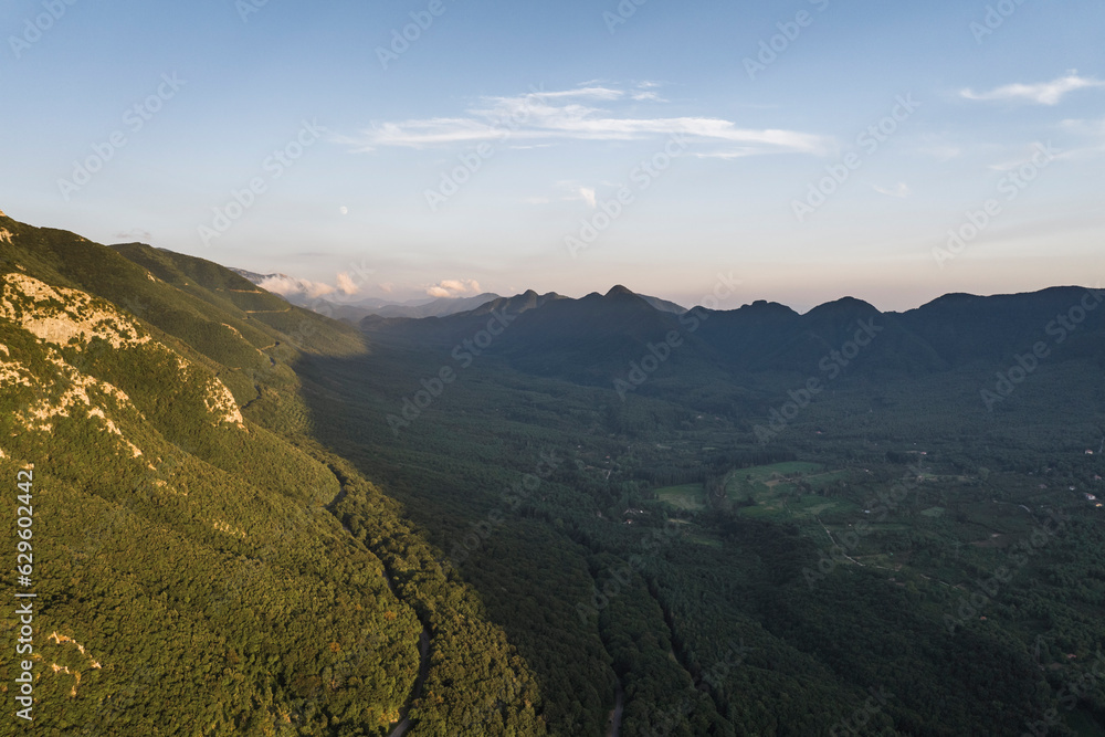 Aerial view of a mountain range at sunset along the Terminio Valley, Serino, Campania, Avellino, Italy. Aerial view of a mountain range at sunset along the Terminio Valley, Serino, Campania, Avellino, Italy.