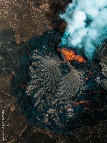 Aerial view of Litli-Hrutur (Little Ram) Volcano during an eruption on Fagradalsfjall volcanic area in southwest Iceland, it's a fissure eruption started on the Reykjanes Peninsula, Iceland.