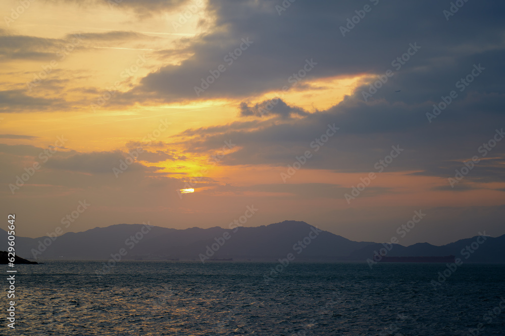 Sunset view over the sea at Kennedy Town, Western District, Hong Kong