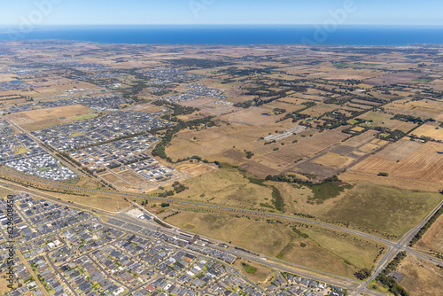 Aerial view of a road crossing the countryside near Mount Duneed, Victoria, Australia. photo