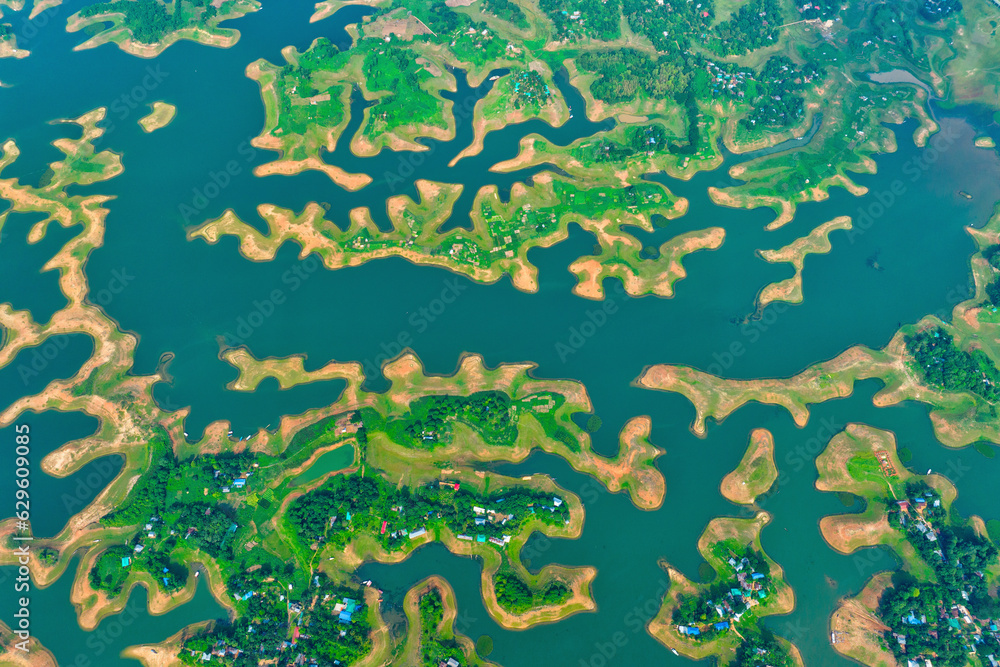 Aerial view of islands in Kaptai Lake in Rangamati District of Chittagong Division in Bangladesh. Aerial view of islands in Kaptai Lake in Rangamati District of Chittagong Division in Bangladesh.