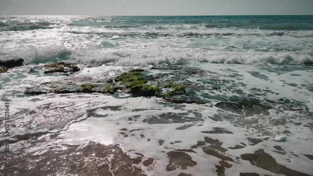 Waves of the sea in the afternoon, blue water. High quality 4k footage Waves of the sea in the afternoon, blue water. High quality 4k footage