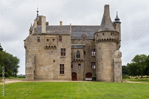 Fototapeta Naklejka Na Ścianę i Meble -  Chateau de Kerouzere in a field in Bretagne, France