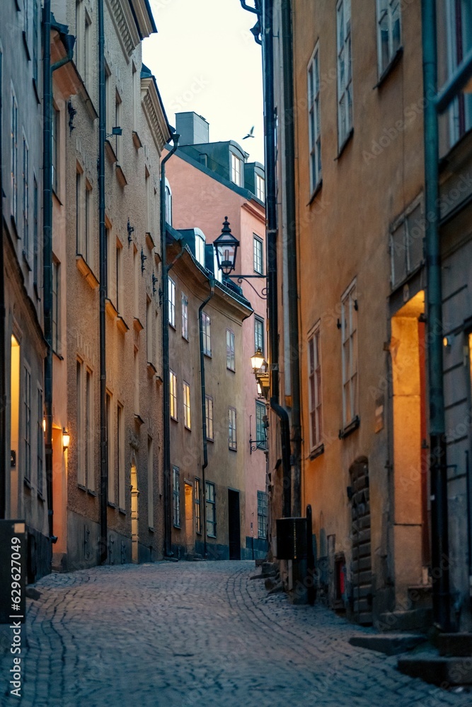 Picturesque cobblestone street with old town buildings. Gamla stan, Stockholm, Sweden.