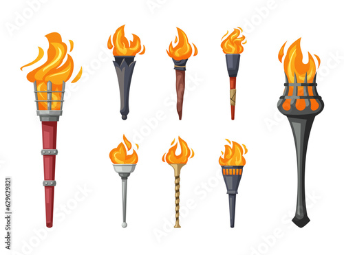 Medieval burning cartoon torches set. ancient metal flaming different shaped torch lights. vector cartoon objects.