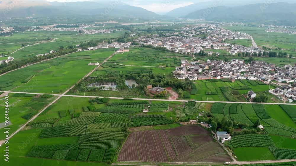Village and fields in Shaxi, Yunnan, China. Village and fields in Shaxi, Yunnan, China.