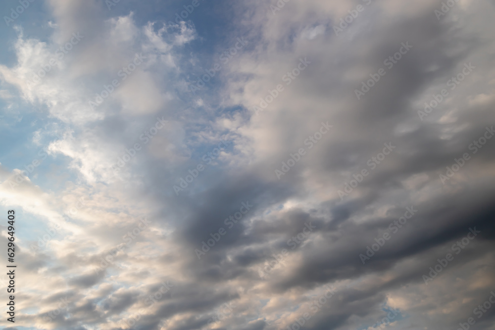 Unusual dark gray layered stratus clouds, skyscape.