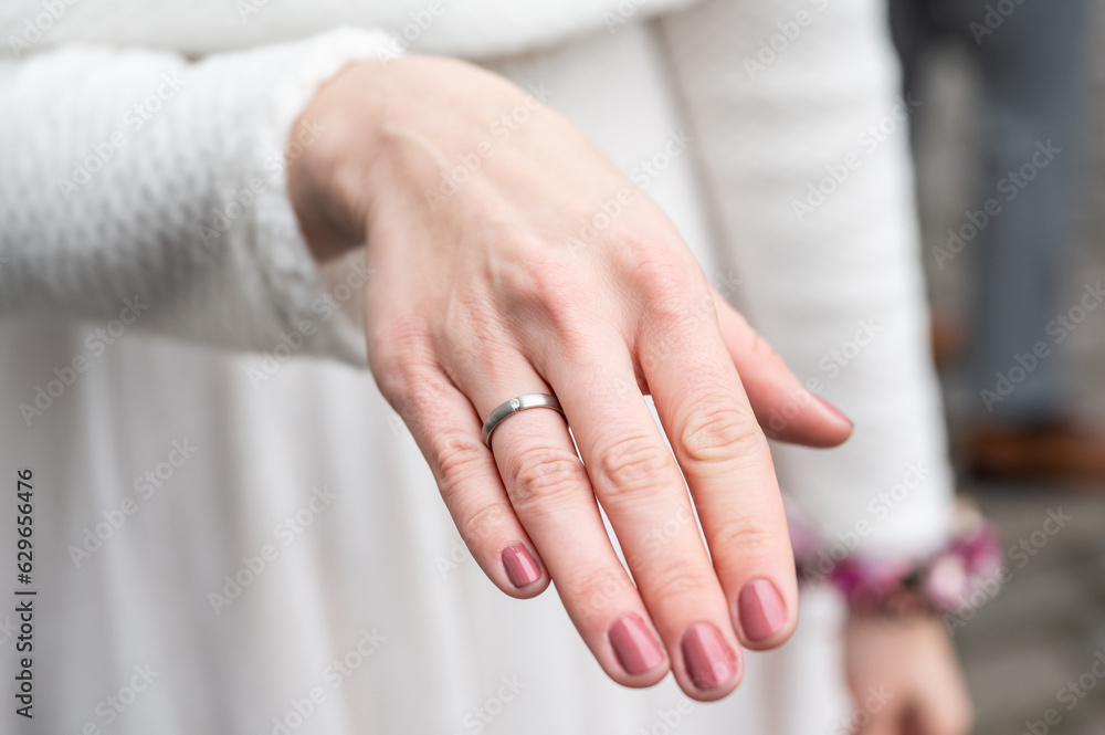 Bride hand with wedding ring closeup detail Bride hand with wedding ring closeup detail