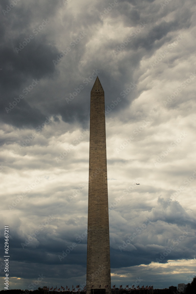 Washington monument under storm clouds