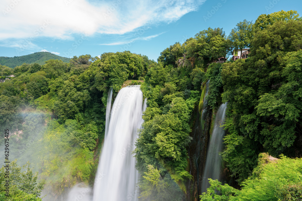 Naklejka premium panoramic view of the Marmore waterfalls, the highest in Europe, in the Umbria region in the province of Terni. They give a sense of power, peace and freshness