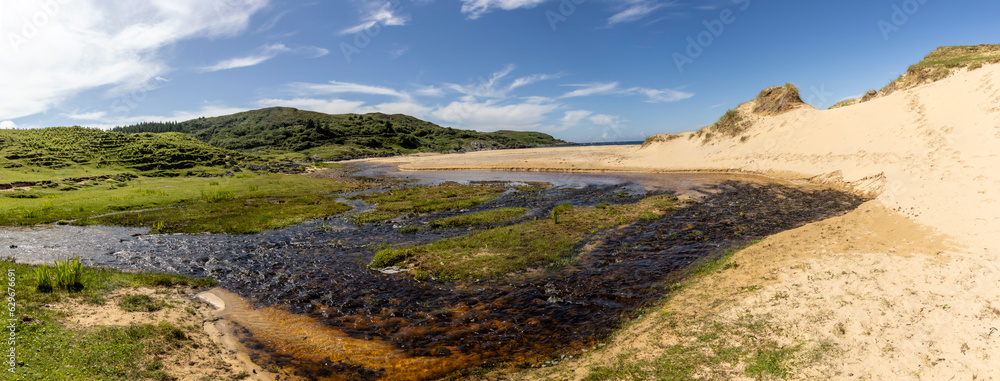 panoramic shot of Kiloran Bay on the isle of Colonsay in Scotland