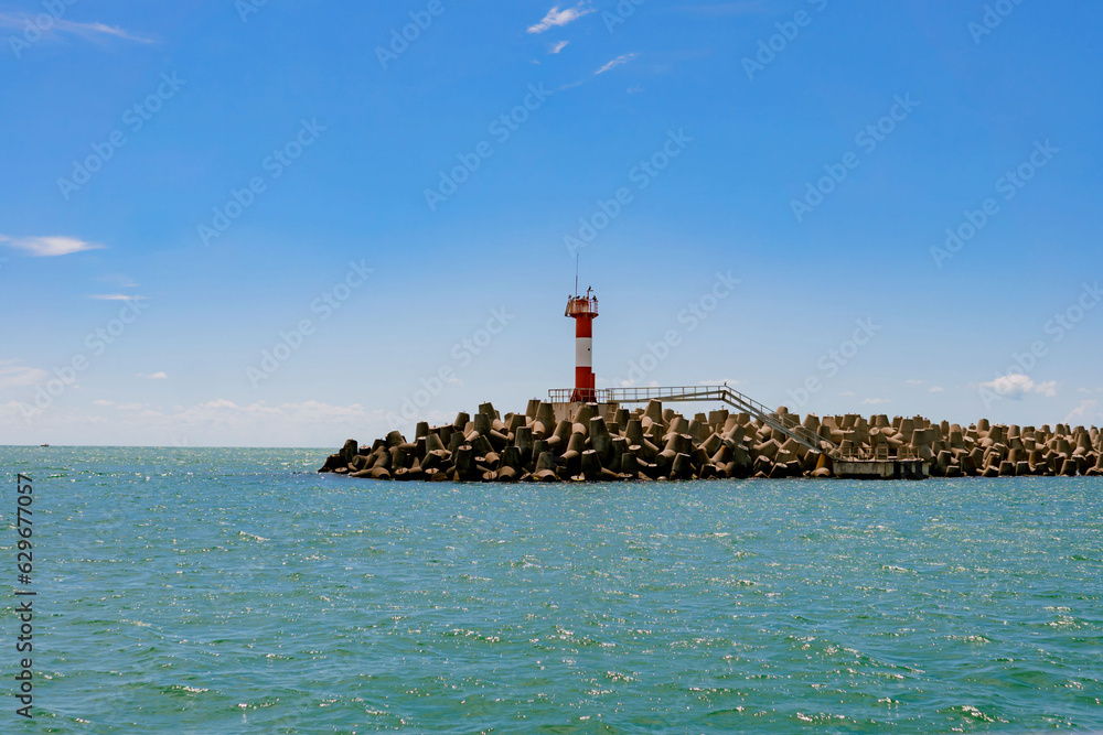 lighthouse or beacon near Sochi sea Port, Russia