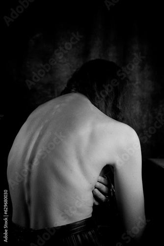 woman from behind showing her back