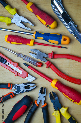 Different types of tools screwdrivers, pliers, nippers.