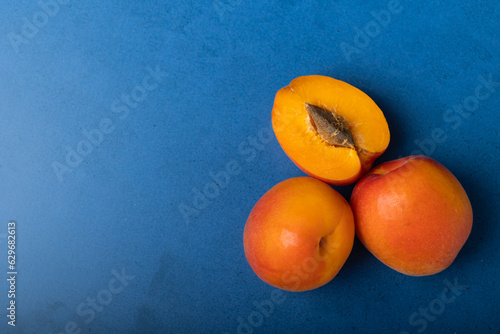 apricots on blue background