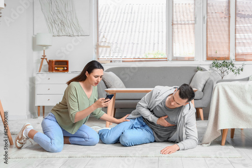 Young woman with mobile pho...