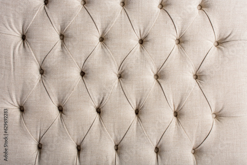 Billede på lærred upholstered headboard with textile upholstery and studded buttons