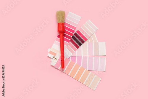 Red paintbrush with pink an...