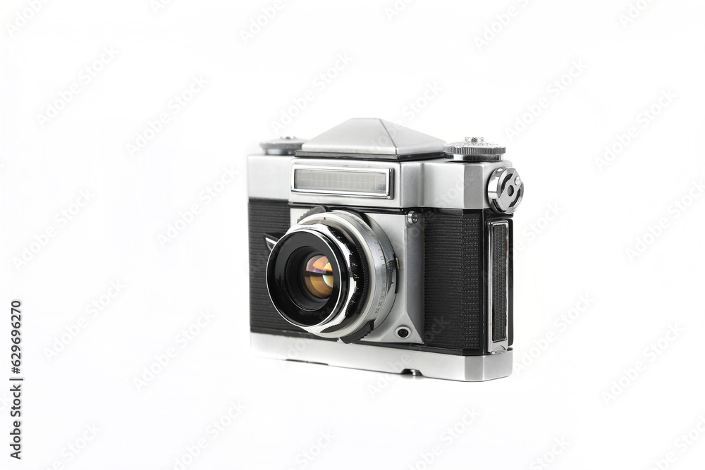 Very rare old 35 mm SLR camera on white background.