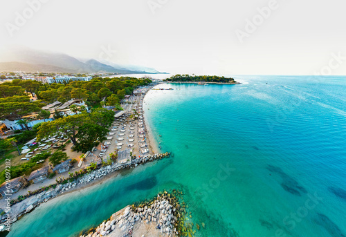 Fototapeta Naklejka Na Ścianę i Meble -  Kemer, Antalya, Turkey. Aerial view of Moonlight Beach in Kemer. Beautiful turquoise colors of Mediterranean sea. Drone shot.