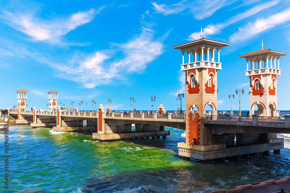 Famous Stanley Bridge on the promenade of Alexandria, view on the famous towers, Egypt