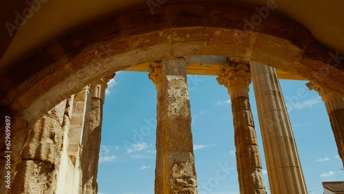 Temple of Diana, Merida, Extremadura, Spain, dating to 1 BC, majestic Roman relic standing tall, epitomizing historic grandeur amid modern urban life photo