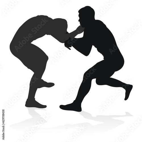 Image of a silhouette of a wrestler athlete in a fighting pose. Greco Roman wrestling, combating, duel, fight, martial art, sportsmanship