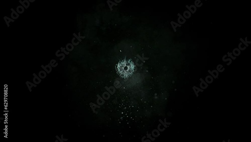 Super Slow Motion Shot of Real Bullet Glass Break Isolated on Black Background at 1000fps. photo