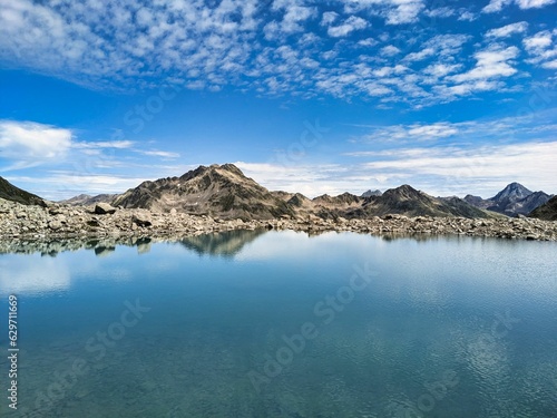 Beautiful mountain lake in the Grisons mountains. Between Schwarzhorn and Piz Radönt. Wanderlust. Davos Switzerland. High quality photo photo