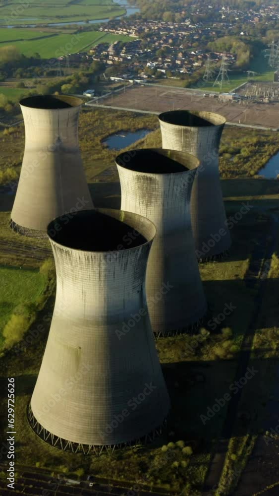 Abandoned and ruined Nuclear Power Plant. Drone shot of coal power plant. Nuclear power plant. Massive coal powered power station. Aerial vertical, vertical video background. Abandoned and ruined Nuclear Power Plant. Drone shot of coal power plant. Nuclear power plant. Massive coal powered power station. Aerial vertical, vertical video background.