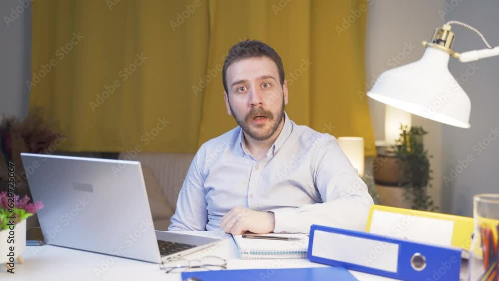 Home office worker man looking at camera confused. Home office worker man looking at camera confused.