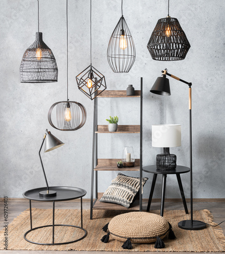 a set of different types of lamps for home decoration atop a neutral-colored carpet, creating an eye-catching contrast inside a modern room photo