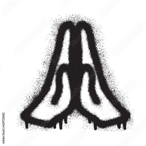 Hand prayer icon graffiti with black spray paint