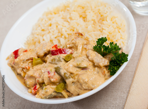 Thai Red Curry served with rice on plate