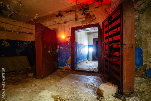 Entrance to bomb shelter protective construction of civil defense. Large armored blast proof doors with valve photo