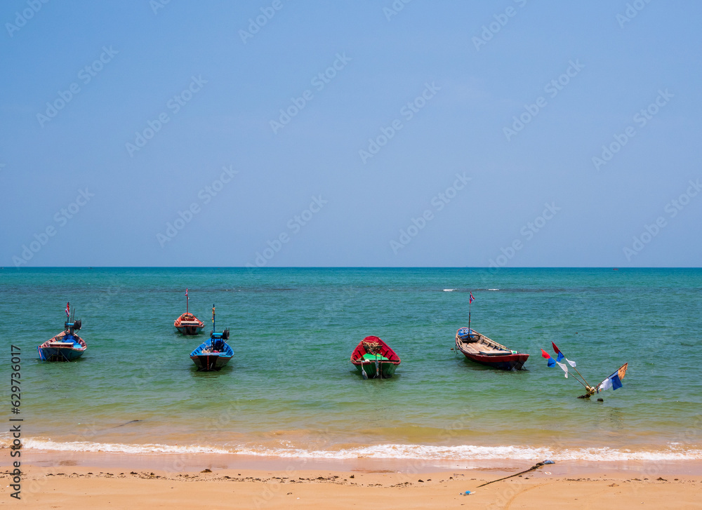 Panorama landscape look view point Small fishing boat wooden parked coast sea beach. after fishing of fishermen in small village It small local fishery. Blue sky, white clouds clear weather