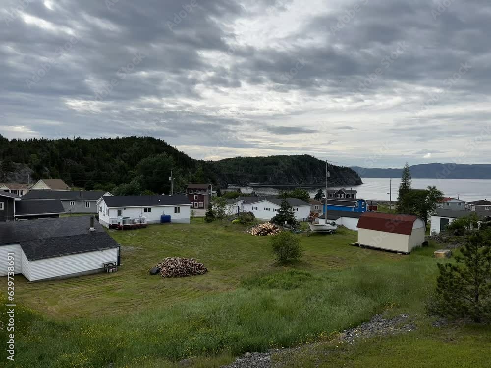A small fishing community, Harry's Harbour, in Newfoundland. The bay is a sheltered cove with