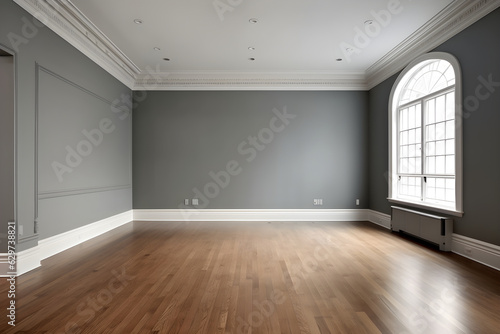 Minimal empty room with gray wall on background. The rooms have wooden floors and gray walls © AspctStyle