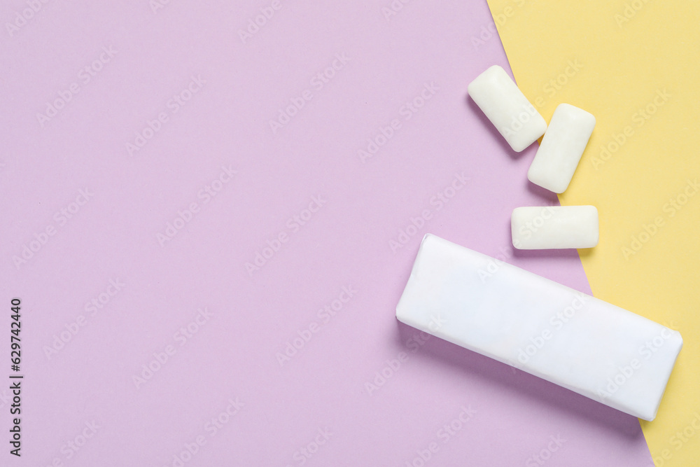 Pack with tasty chewing gums on color background, flat lay. Space for text Pack with tasty chewing gums on color background, flat lay. Space for text
