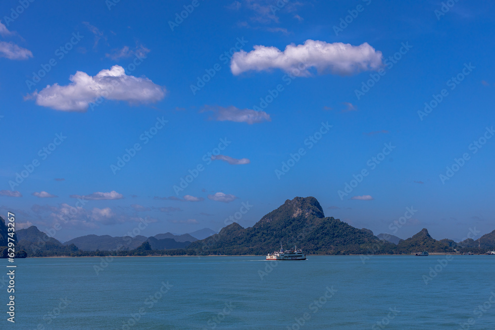 The background of the sea by the evening sea, with natural beauty (sea water, rocks, sky) and fishermen are fishing by the river bank, is a pleasure during travel. The background of the sea by the evening sea, with natural beauty (sea water, rocks, sky) and fishermen are fishing by the river bank, is a pleasure during travel.