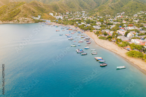 Boats in the sunset, Taganga beach in Colombia photo